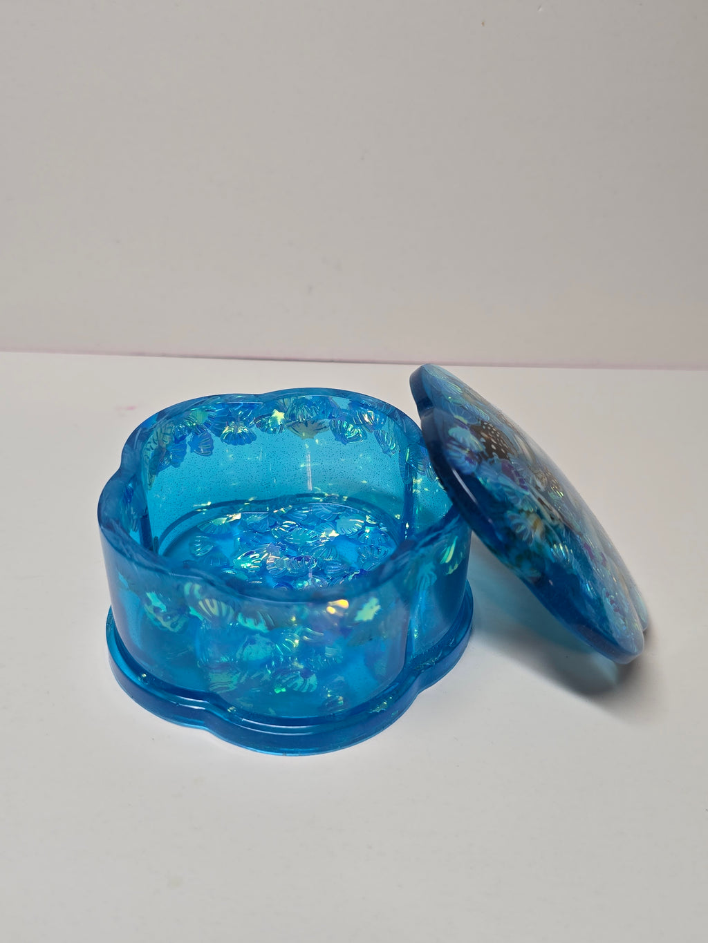 Blue trinket jar with shells